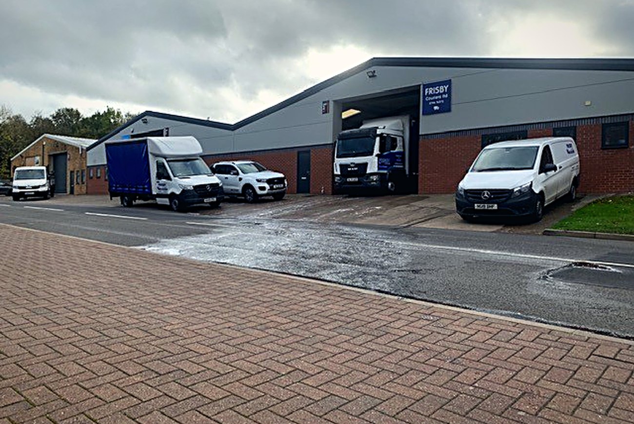 The Frisby Couriers fleet of vans and a rigid lorry outside the Bridgnorth depot