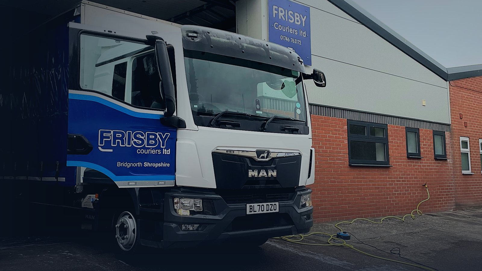 A Frisby Couriers MAN lorry in full livery at the company depot in Bridgnorth, Shropshire